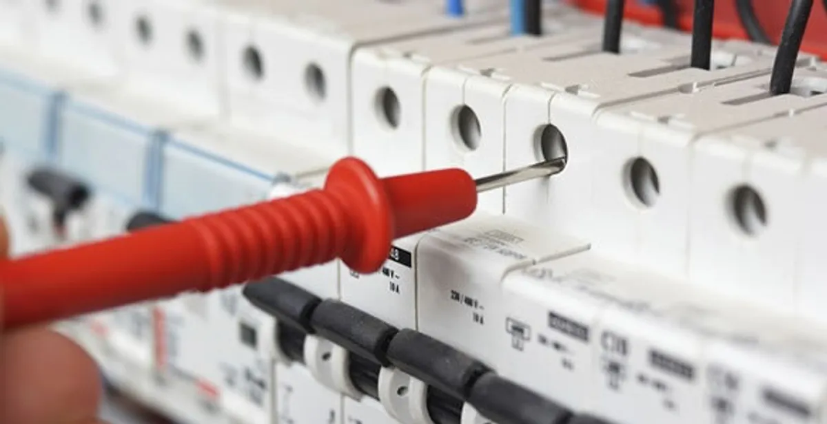 Electrical contractor testing circuit breakers during electrical repair in Macungie, PA