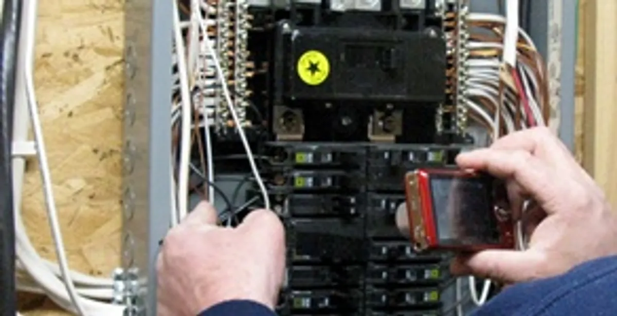 Home electrical inspection of circuit breaker panel by licensed electrician in Allentown, PA