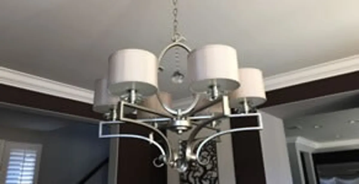 Modern chandelier installation with multiple light fixtures in Allentown, PA